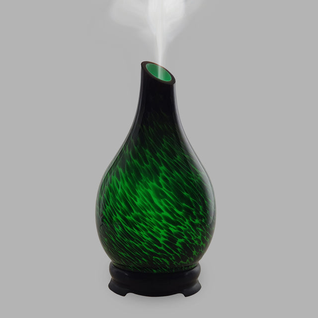 The dark background of this essential oil diffuser allows striking green and yellow to create an explosion of colour making it the perfect diffuser for any room. 