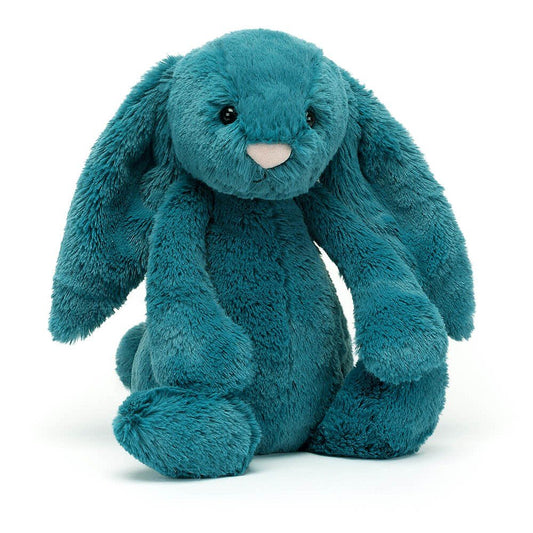 Put your paws together for Bashful Mineral Blue Bunny! Snuggly-stunning in cosy teal fur, and a keen explorer, this lop-eared bunny loves gathering pebbles and peering into caves! Take a cool blue buddy wherever you go for soothing cuddles and bobtail bedtimes.