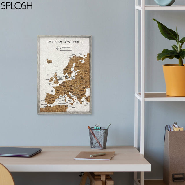 Splosh Europe Map Travel edition displayed on wall – scratchable and pinnable world map for travelling Europe and recording journeys.