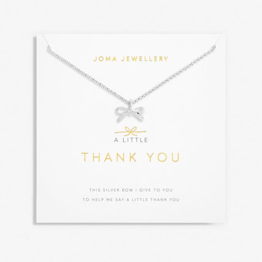 Our A Little Thank You Necklace features an elegant silver-plated chain and a sparkling bow charm. Perfectly presented on one of our signature stylised cards and framed by a sweet sentiment. This piece was made to be cherished now and for years to come.