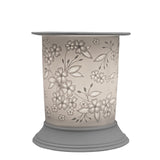 The porcelain material on this Wax Melt Burner allows bright light to shine through it, providing the opportunity to create this striking Spring design. This is done by crafting images out of thicker and thinner sections of the porcelain, allowing for detailed shadowing and a 3D effect. The porcelains elegant look will fit perfectly in any room is available in a range of designs and two different shapes.