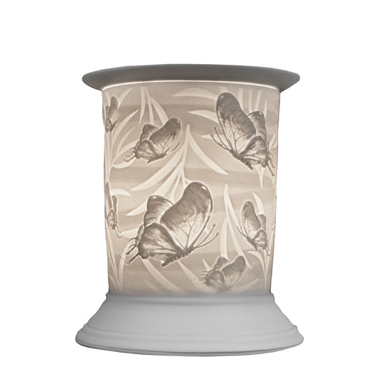 The porcelain material on this Wax Melt Burner allows bright light to shine through it, providing the opportunity to create this gorgeous Butterfly design in our signature straight style. This is done by crafting images out of thicker and thinner sections of the porcelain, allowing for detailed shadowing and a 3D effect. The porcelains elegant look will fit perfectly in any room is available in a range of designs and two different shapes.