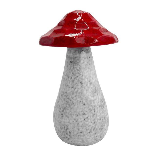 Close-up of large red porcelain mushroom ornament, hand-crafted with textured finish for natural and playful home décor.
