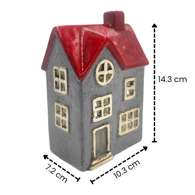 Glow Manor Cottage grey ceramic tealight holder with red accents, shown with dimensions 16.8 cm tall, 12 cm wide, and 7.2 cm deep.
