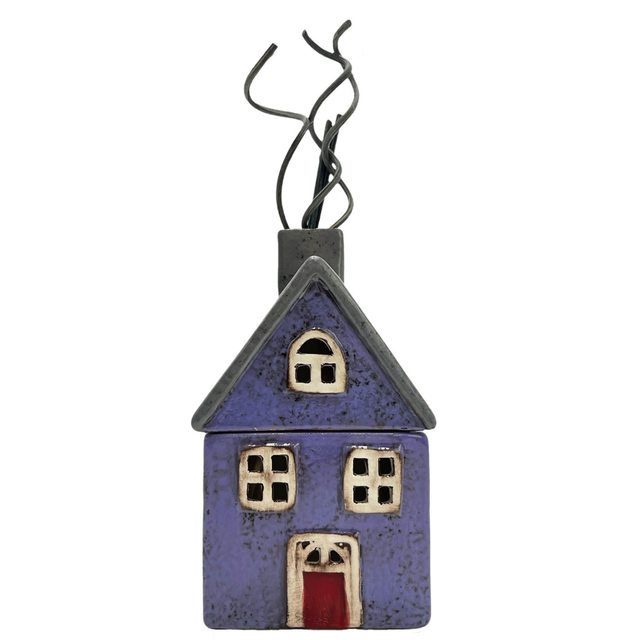 Purple and grey ceramic cottage-shaped reed diffuser with red door and chimney, Wildflower Garden fragrance.