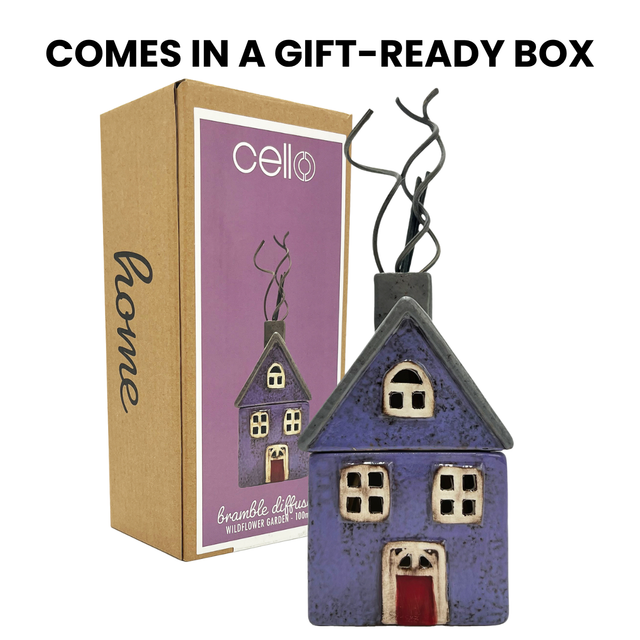 Wildflower Garden cottage reed diffuser in purple and grey shown with its eco-friendly gift-ready Cello Home box.