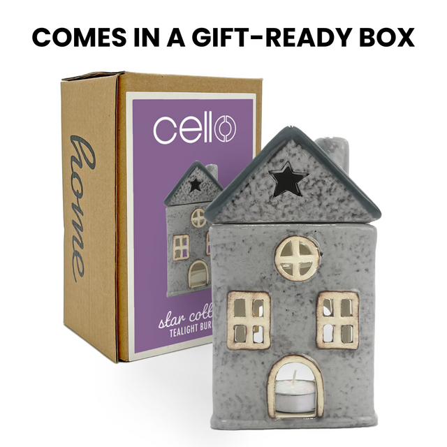 Star Cottage ceramic candle wax burner with Cello branded packaging, porcelain house candle wax burner in a decorative gift box.