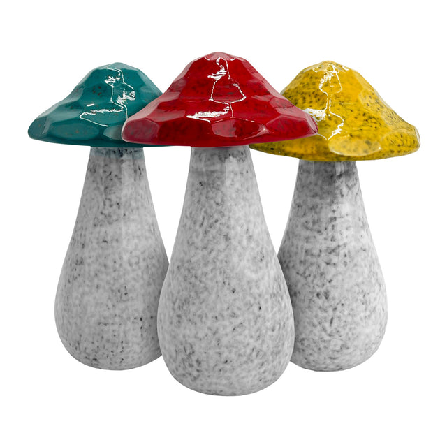 Set of three hand-crafted medium porcelain decorative mushrooms with earthy glazes in green, red, and yellow, designed for modern and rustic home décor.