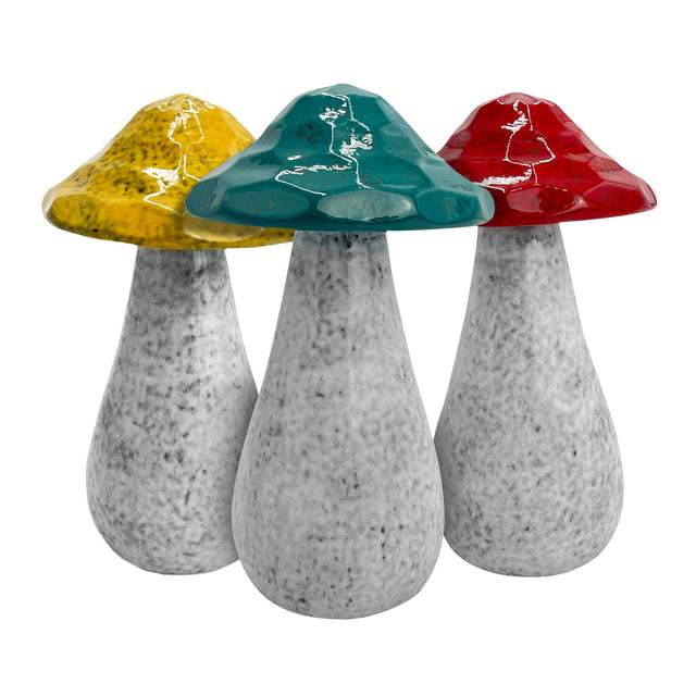 Set of three hand-crafted large porcelain decorative mushrooms with earthy glazes in green, red, and yellow, designed for modern and rustic home décor.
