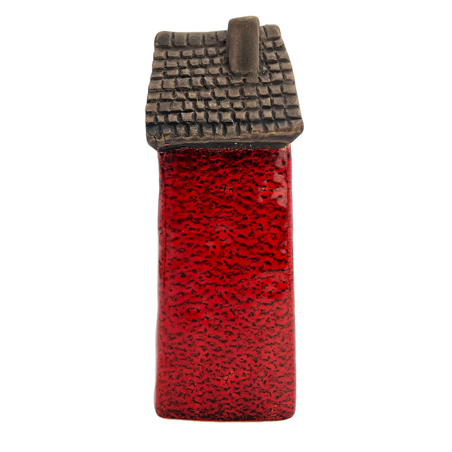 Back view of the red Scribe’s Retreat ceramic LED house displaying textured brick pattern and hand-painted design.