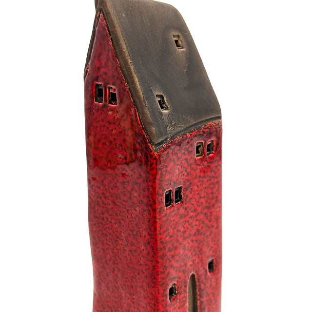 Close-up of the Brackenwood Manor red ceramic house showing fine roof textures and detailed window craftsmanship.