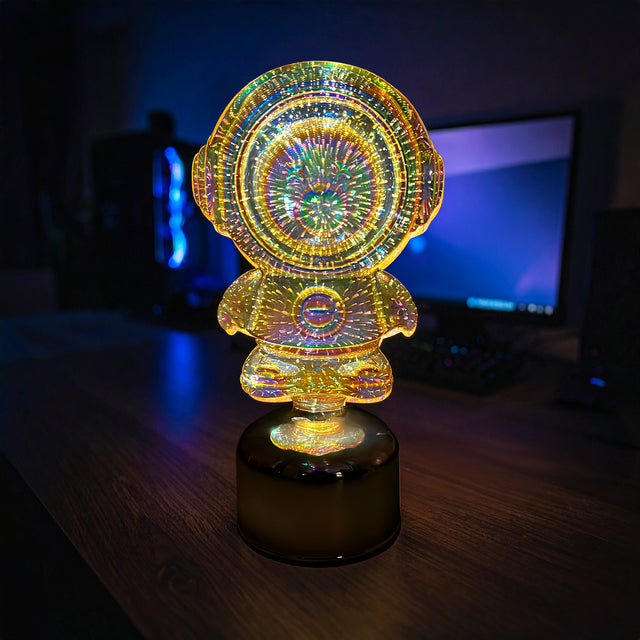 Gleneagles Rotating Gold Bear Battery Lamp illuminating a cosy bedroom at night, its rotating gold bear design creating a calming glow and soothing bedtime atmosphere.