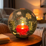 Small Gleneagles Christmas Neon LED USB Glass Lamp glowing on a side table in a cosy living room, adding festive warmth and colourful light to modern Christmas décor.