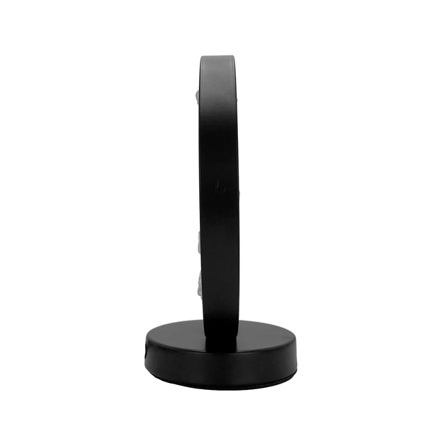 Side view of the Gleneagles Circle Earth Rose Quartz Lamp, displaying the sleek circular frame and gentle LED glow illuminating the crystal.