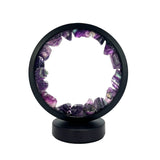 Front view of the Gleneagles Circle Earth LED Lamp – Purple Fluorite, showing circular frame and soft glowing crystal light.