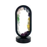Front view of Gleneagles Oval Earth LED Lamp – Mixed Minerals showing natural gemstones encased in elegant oval glass with soft LED glow.