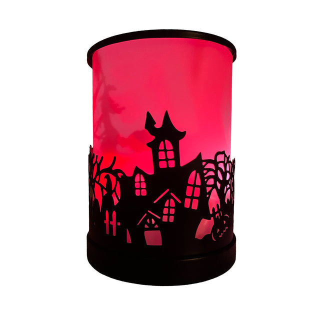 Cello Haunted House Colour-Changing Electric Melt Burner glowing red, casting a spooky Halloween ambience with warm, eerie illumination.