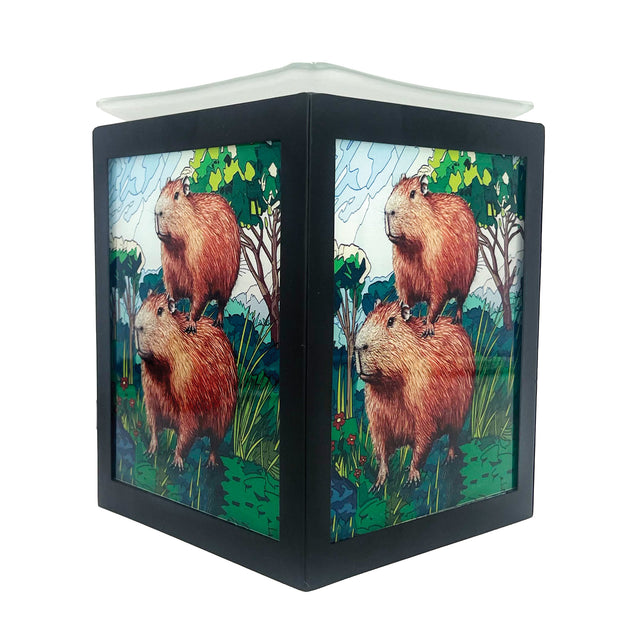 Cello Capybara Electric Melt Burner illuminated, showcasing stained-glass-style light and rustic capybara design for cosy home fragrance.