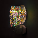 Infinity Skull Plug In Electric Wax Melt Burner glowing in a modern home setting, adding gothic style and relaxing fragrance to the room.