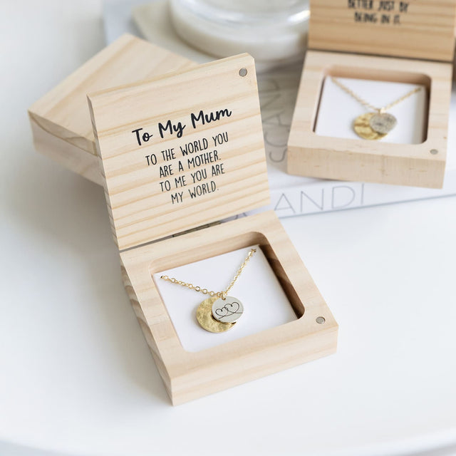 Splosh Heart & Soul Jewellery gift boxes arranged together on a styled surface, showcasing the elegant “To My Mum” necklace among the collection.