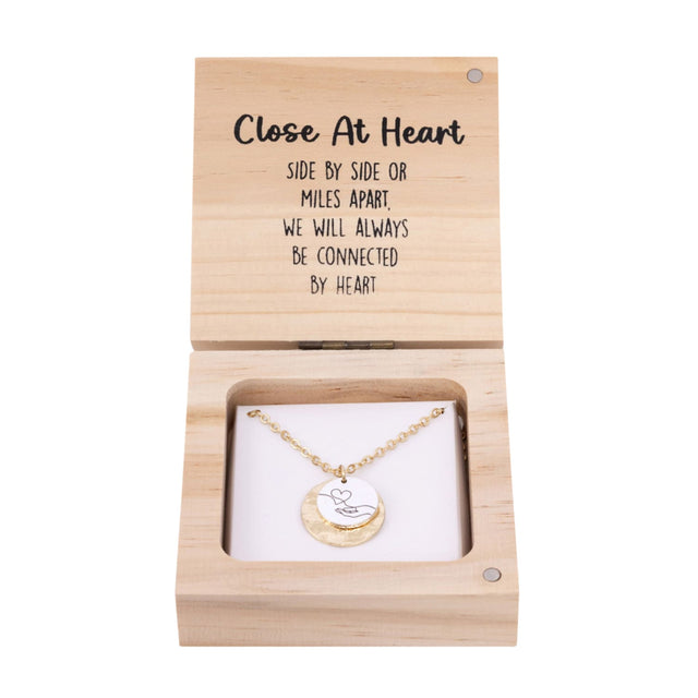 Splosh Heart & Soul Necklace – Close At Heart displayed in an open wooden gift box with gold-plated necklace and “Close at heart” message card inside.