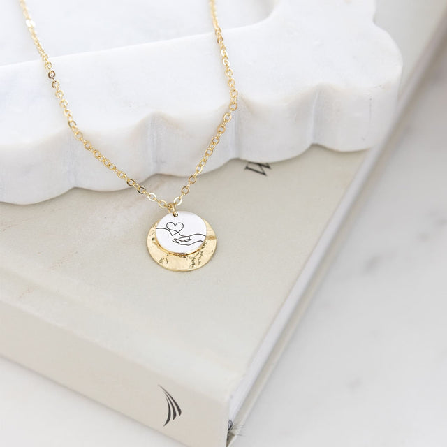 Splosh Heart & Soul Jewellery gift boxes arranged together on a styled surface, featuring the “Close At Heart” necklace alongside other meaningful designs.