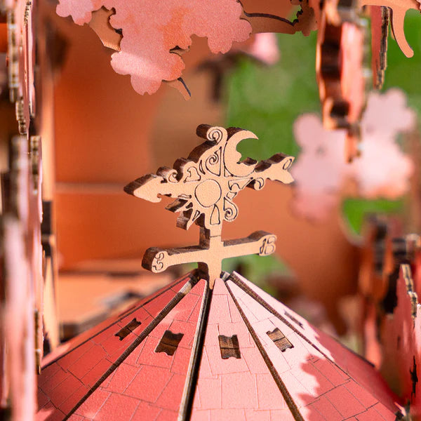 Rolife kits Sakura Tree House interior view with detailed wooden floors and miniature furniture