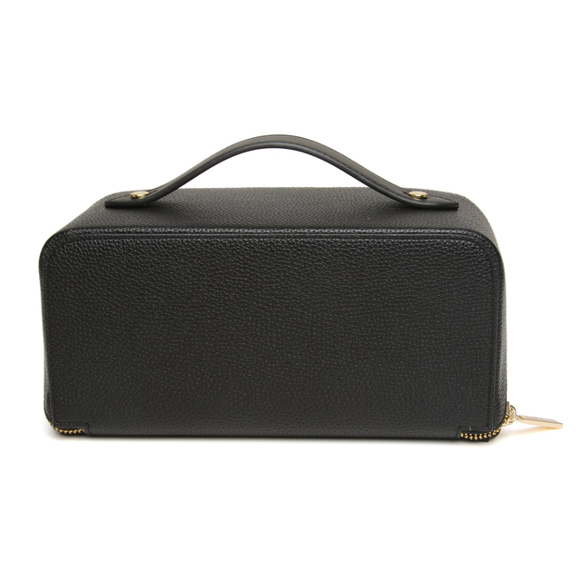 Close-up of the Alice Wheeler Kensington black beauty train case showing premium finish and signature detailing