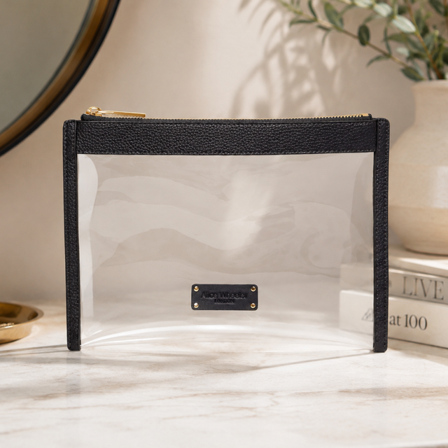 Alice Wheeler clear cosmetic bag with black trim and transparent front