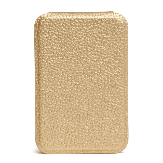 Alice Wheeler compact gold makeup mirror with textured metallic finish