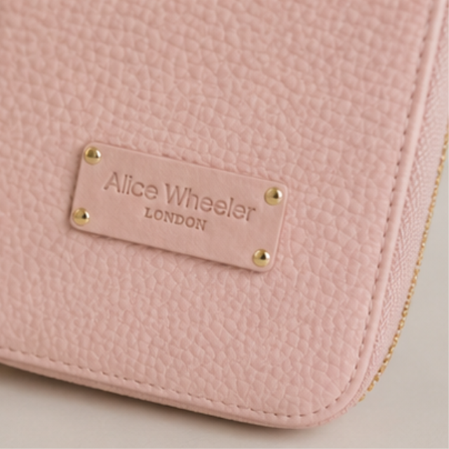 Alice Wheeler Pink heat-resistant straightener pouch with gold-tone zip branding detail