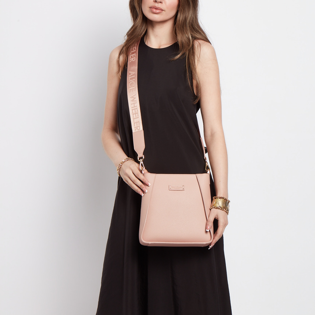 Alice Wheeler Pink vegan leather handbag styled for shopping, travel and everyday wear