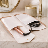 Alice Wheeler Stone hair straightener travel case open with styling tool and cable inside