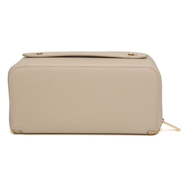 Close-up of the Alice Wheeler Kensington stone makeup train case with premium finish and signature Alice Wheeler London detailing