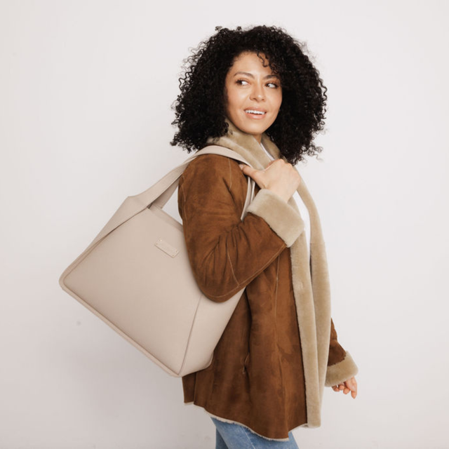 Alice Wheeler Stone work tote bag with comfortable shoulder straps and secure zip-top fastening
