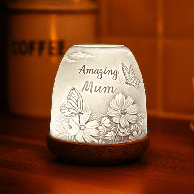 Amazing Mum porcelain tealight holder glowing in a warm home setting