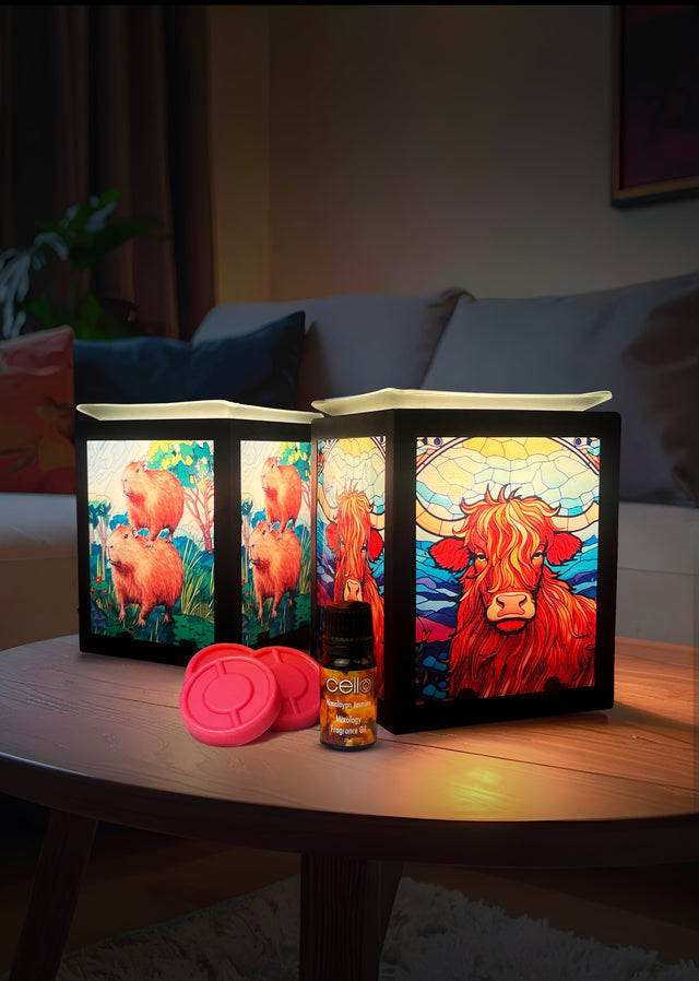 Cello Capybara and Highland Cow electric wax melt burner range