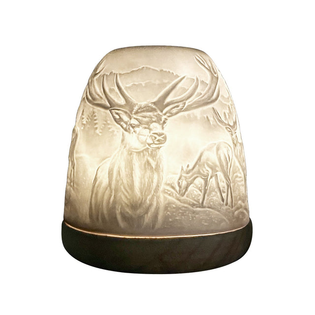 Detailed lit design of Highland Stag on porcelain tall tealight dome
