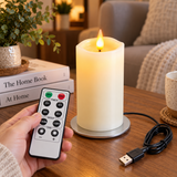 Cello Living Flame 17cm LED pillar candle being controlled with the included remote