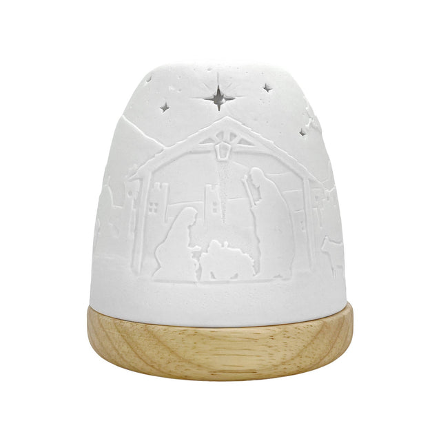 Unlit porcelain Nativity tealight dome showing embossed design