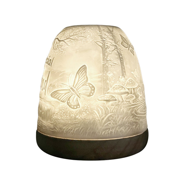 Unlit white porcelain Special Friend tealight dome showing engraved detailing.