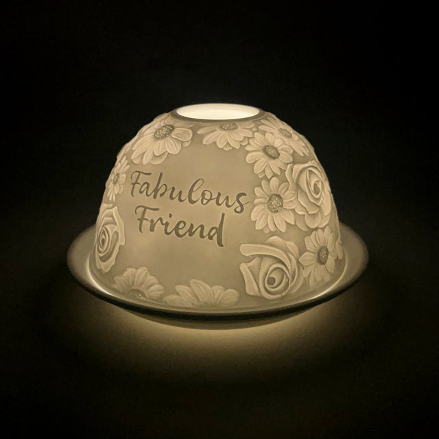 Cello Fabulous Friend porcelain tealight dome glowing with floral lithophane design.