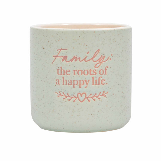 Ceramic plant pot indoor with family message by Splosh