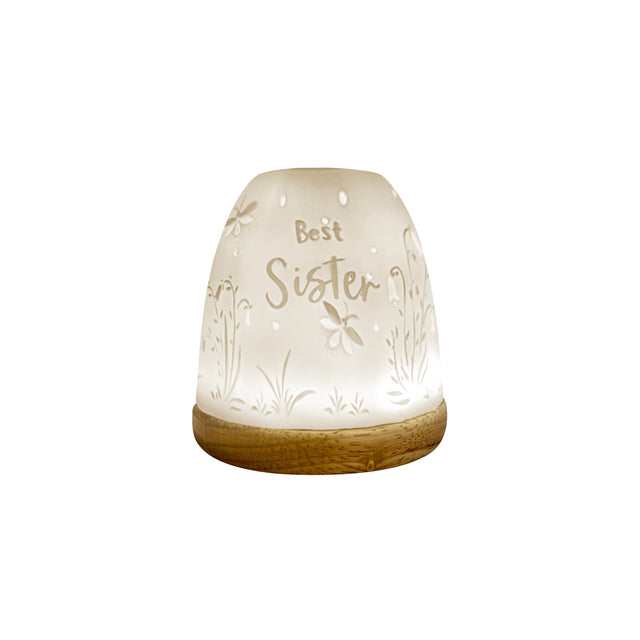 Ceramic tealight holder with lithophane glow