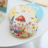 Splosh Cottage Grove Mushroom ceramic coaster displayed with other ceramic coasters in the collection.
