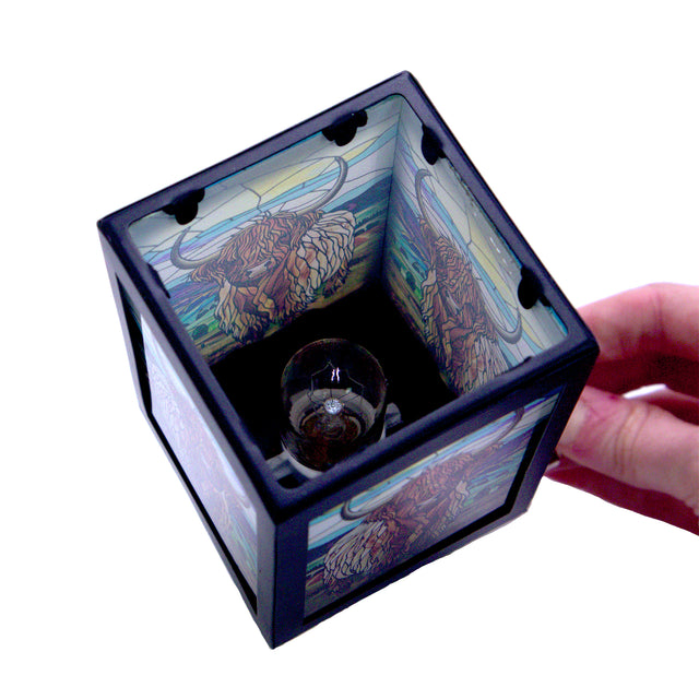 Decorative highland cow electric oil burner for subtle fragrance