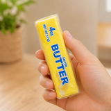 Fruit Butter slow-rise squishy fidget toy being squeezed in hand for stress relief, anxiety reduction and sensory play