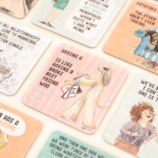 Collection of illustrated drinks coasters with humorous and thought-provoking text and graphics.