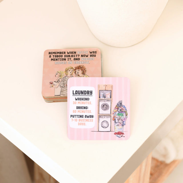 Drinks coasters with humorous designs on a light background