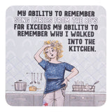 Drinks coasters with illustration of a woman in a kitchen and humorous text about remembering song lyrics from the 80s.
